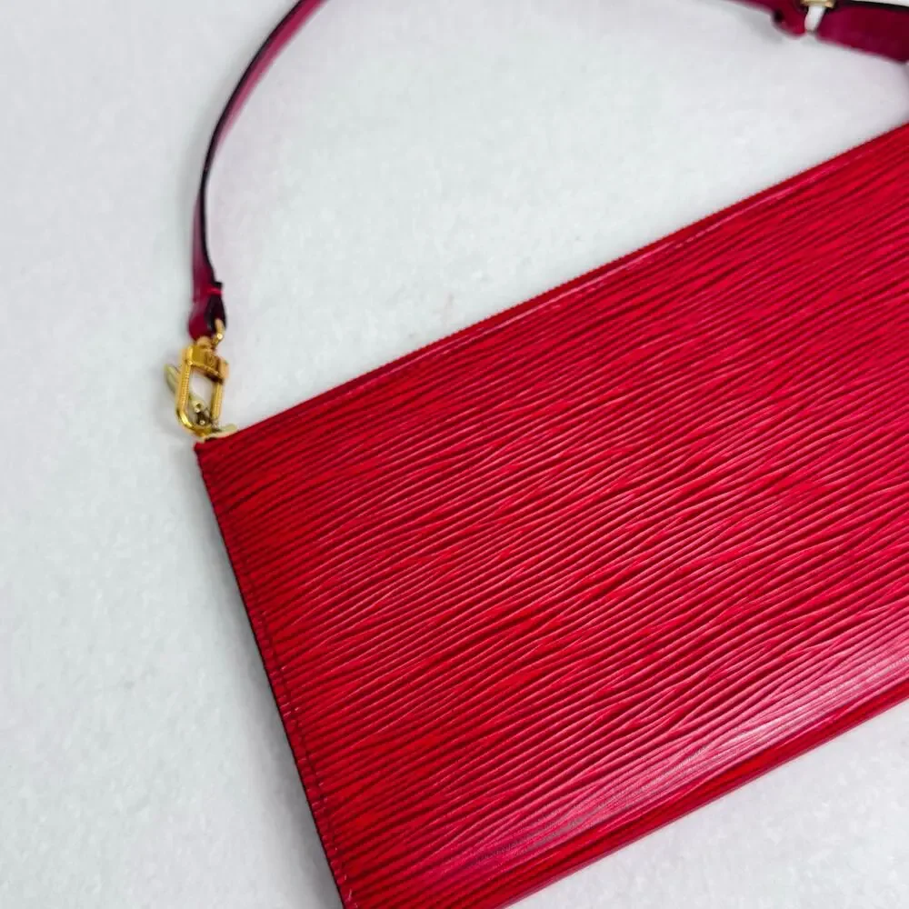 Louis Vuitton Epi Pochette Accessoires 24 Red wristlet gold hardware.